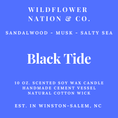 Load image into Gallery viewer, Blue and white product label for Wildflower Nation & Co. Black Tide scented soy wax candle, featuring the scent notes Sandalwood - Musk - Salty Sea and product details in white text.