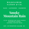 Load image into Gallery viewer, A bright green square label with white text reading 'WILDFLOWER NATION & CO.' and 'Smoky Mountain Rain,' plus scent notes 'SAGE - LAVENDER - OAKMOSS' and product details for a 10 oz.
