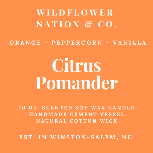A flat orange label with white text reading 'WILDFLOWER NATION & CO.' and 'Citrus Pomander,' plus product details for a 10 oz.