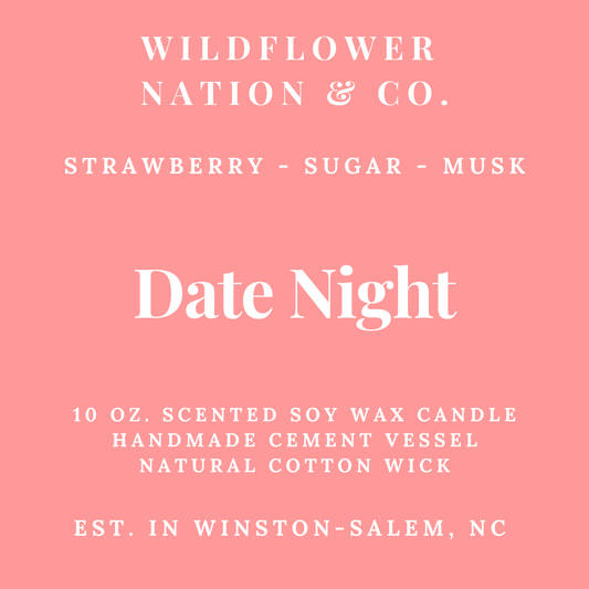 A square pink label with white text reading 'WILDFLOWER NATION & CO.' and 'Date Night,' plus scent notes 'Strawberry - Sugar - Musk' and product details for a 10 oz.