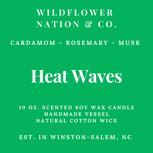 A green square label with white text reading 'WILDFLOWER NATION & CO.' and 'Heat Waves,' plus scent notes 'CARDAMOM - ROSEMARY - MUSK' and product details for a 10 oz.